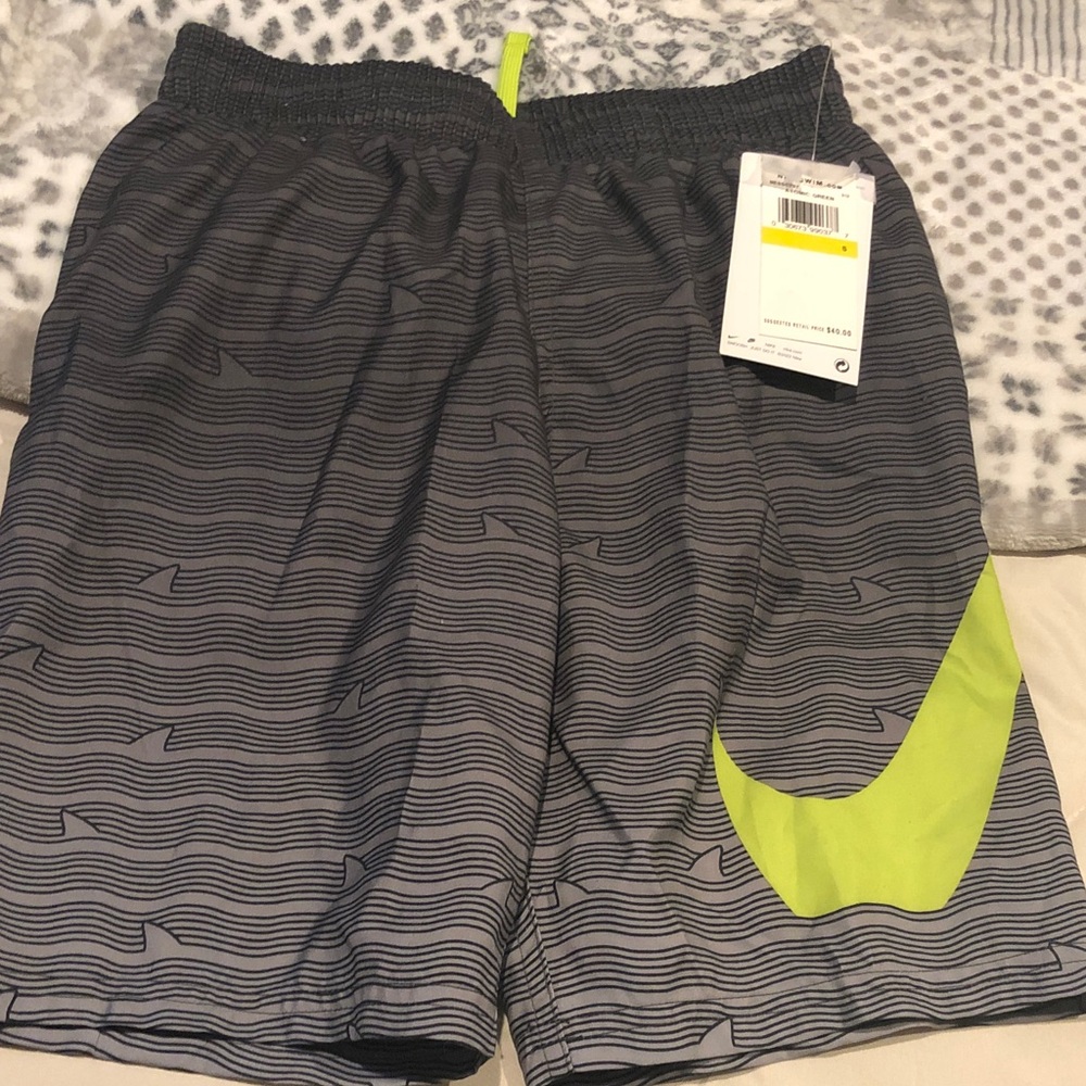 Nike Gray Striped Athletic Shorts with Neon Yellow Swoosh